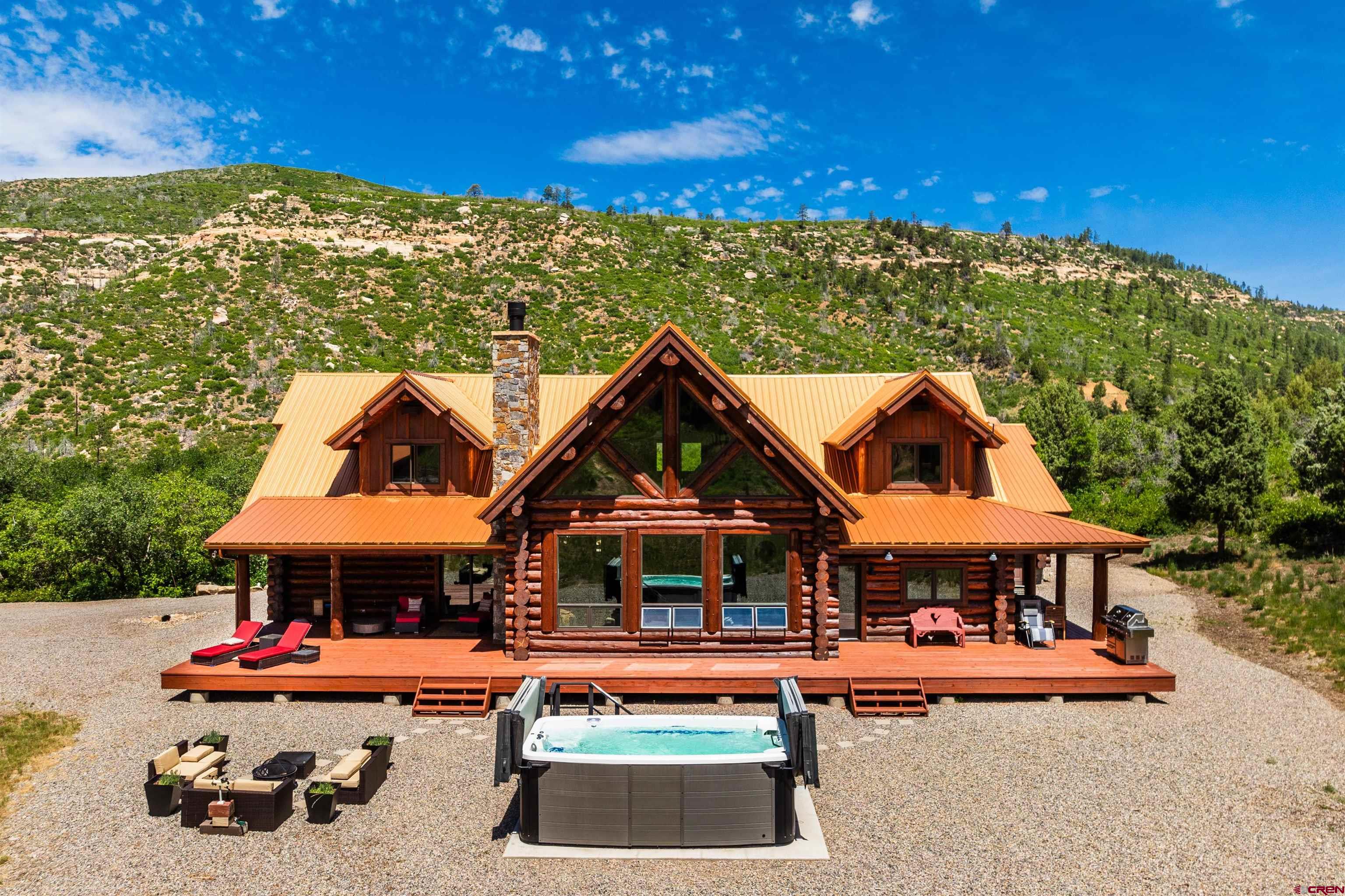 6590 Road 46 Mancos, CO 81328 - Photo 4 of 35 an outdoor space with pool and furniture