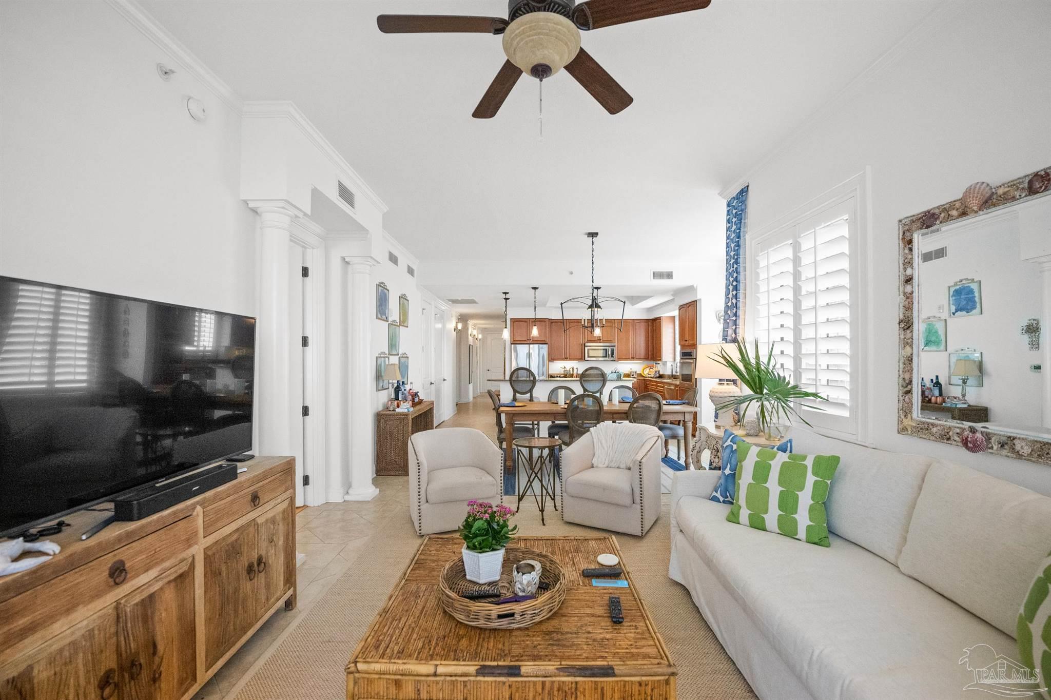 14500 River Road, Unit 101 Pensacola, FL 32507 - Photo 16 of 61 a living room with furniture and a flat screen tv