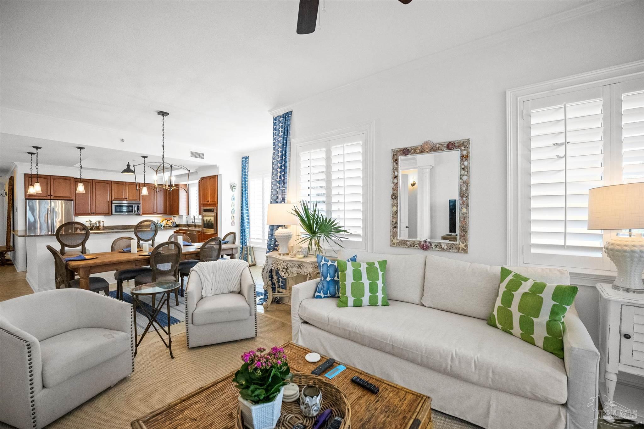 14500 River Road, Unit 101 Pensacola, FL 32507 - Photo 18 of 61 a living room with furniture and a large window