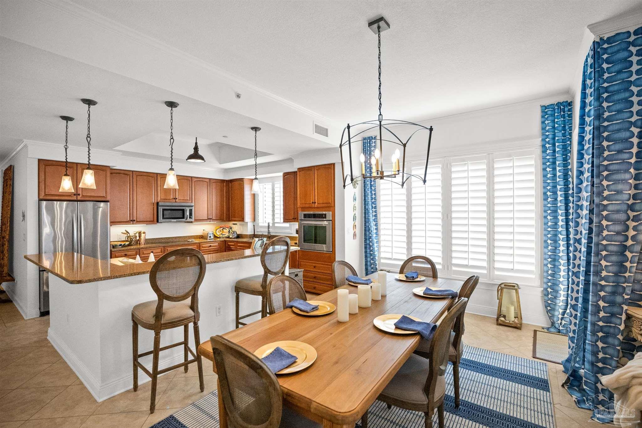 14500 River Road, Unit 101 Pensacola, FL 32507 - Photo 19 of 61 a view of a dining room and livingroom furniture