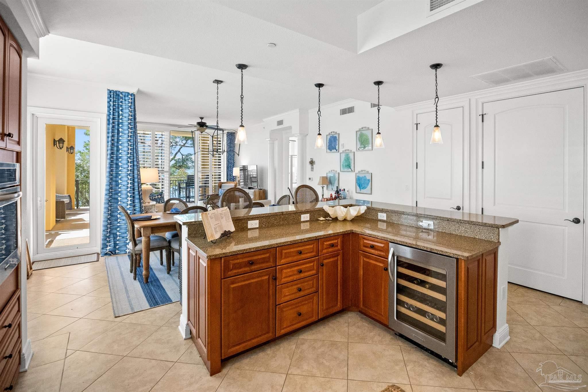 14500 River Road, Unit 101 Pensacola, FL 32507 - Photo 26 of 61 a kitchen with a sink counter top space and appliances