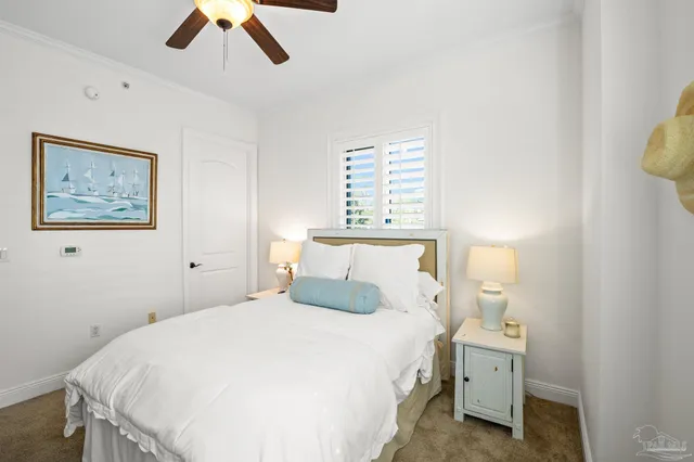 a view of a chairs and table in the balcony