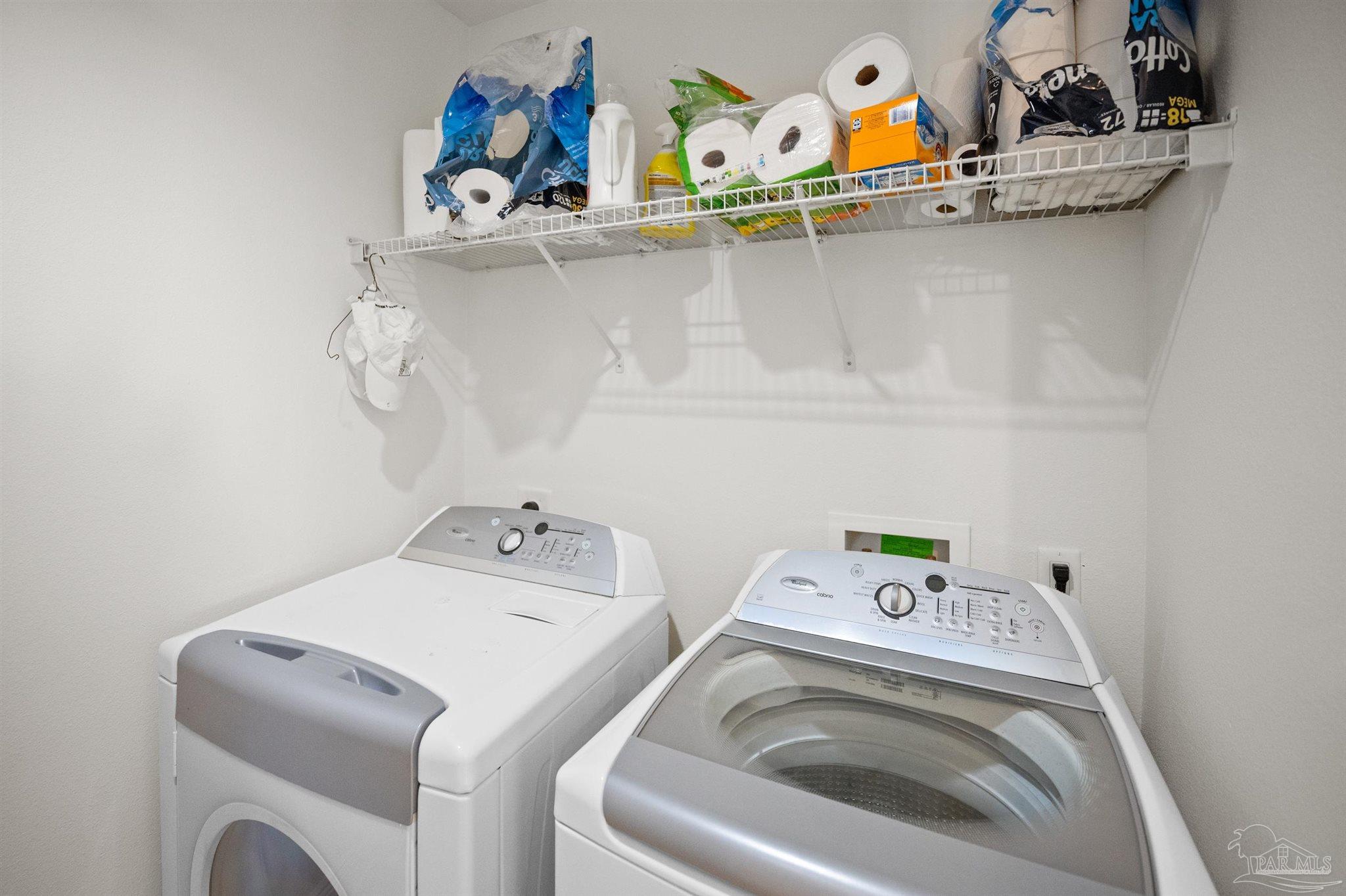 14500 River Road, Unit 101 Pensacola, FL 32507 - Photo 56 of 61 a utility room with dryer and washer