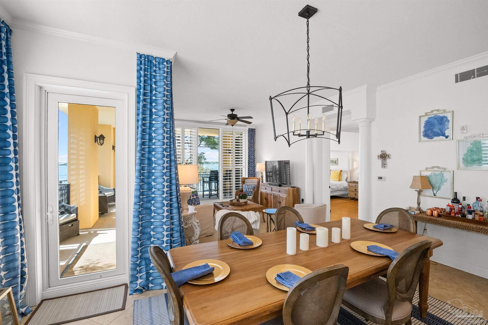 14500 River Road, Unit 101 Pensacola, FL 32507 - Photo 57 of 61 a view of a dining room with furniture window and outside view