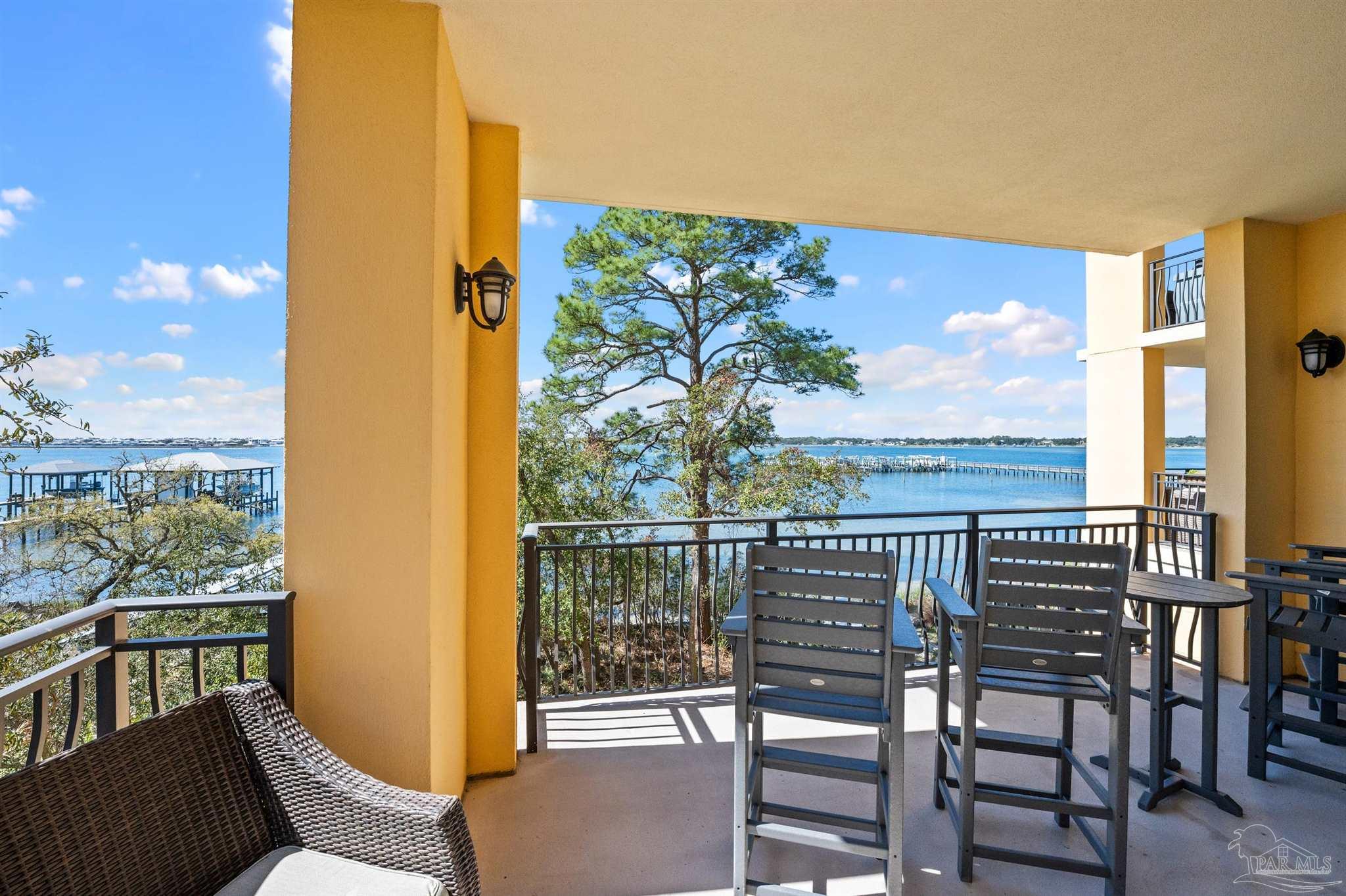 14500 River Road, Unit 101 Pensacola, FL 32507 - Photo 58 of 61 a view of a chairs and table in the balcony
