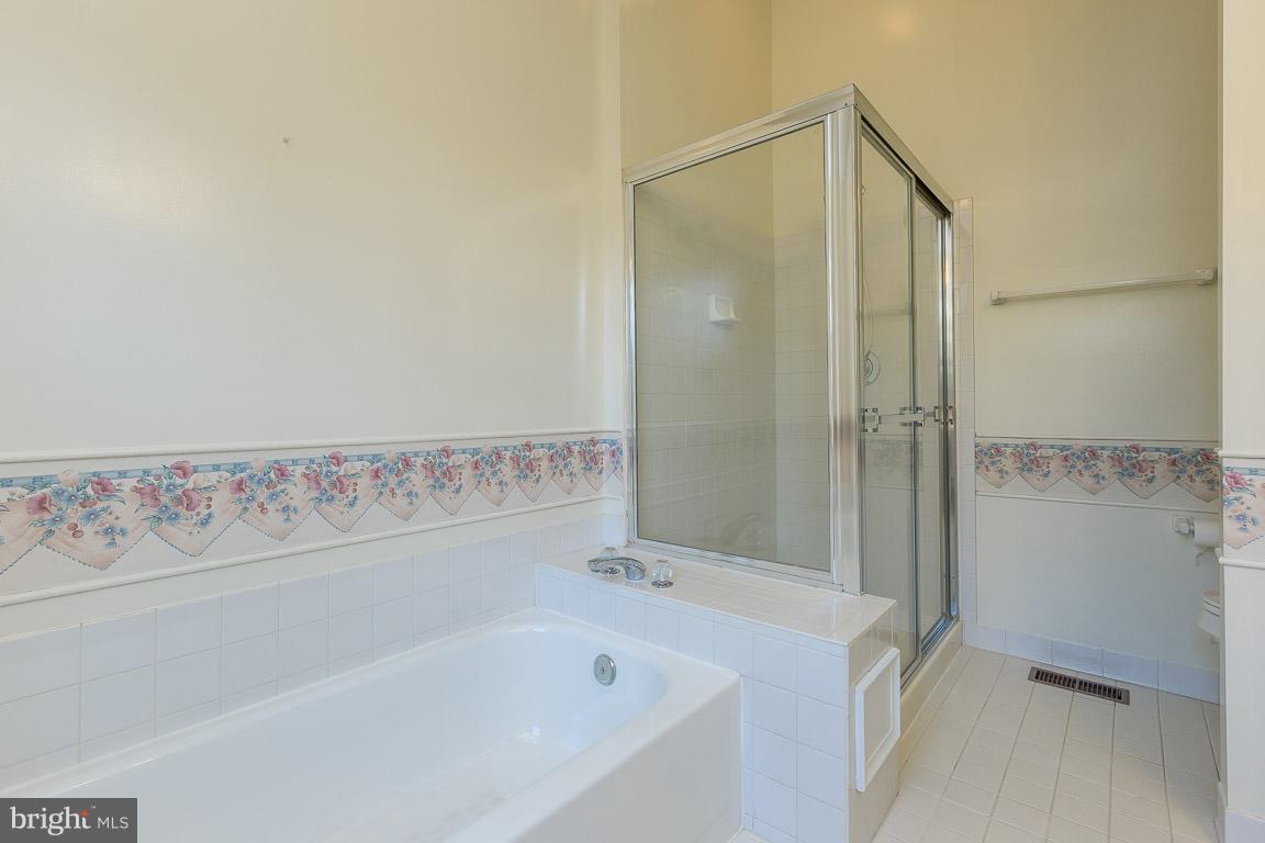 5592 Rivendell Place Frederick, MD 21703 - Photo 21 of 28 Master bath with separate tub and shower
