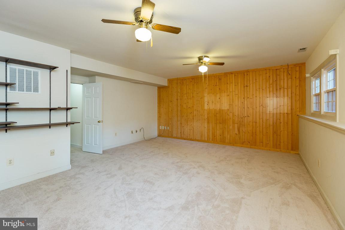 5592 Rivendell Place Frederick, MD 21703 - Photo 26 of 28 Built-in shelving in basement