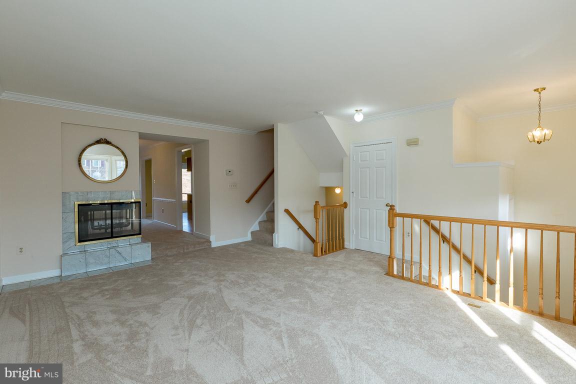 5592 Rivendell Place Frederick, MD 21703 - Photo 4 of 28 Double-sided wood-burning FP