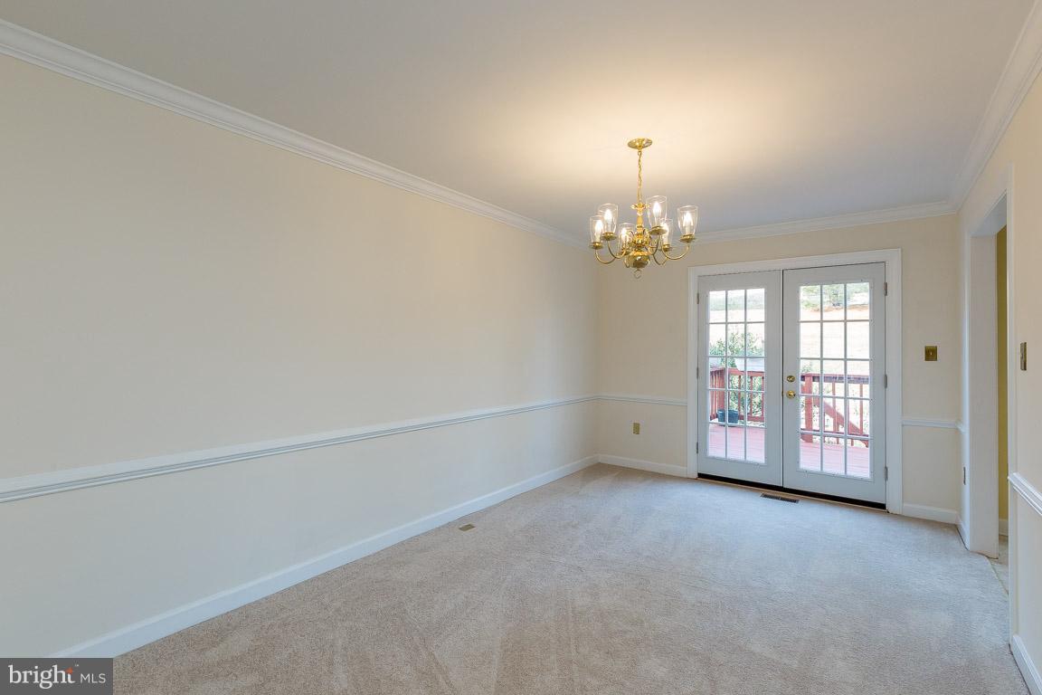 5592 Rivendell Place Frederick, MD 21703 - Photo 7 of 28 Dining Room w/brand new french doors to the deck