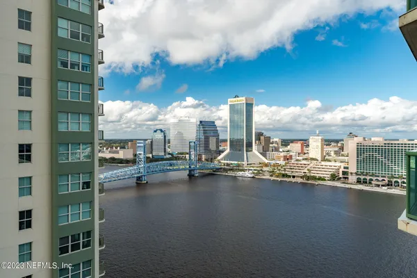 a view of a city with tall buildings