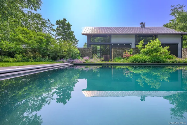 a view of lake with green space