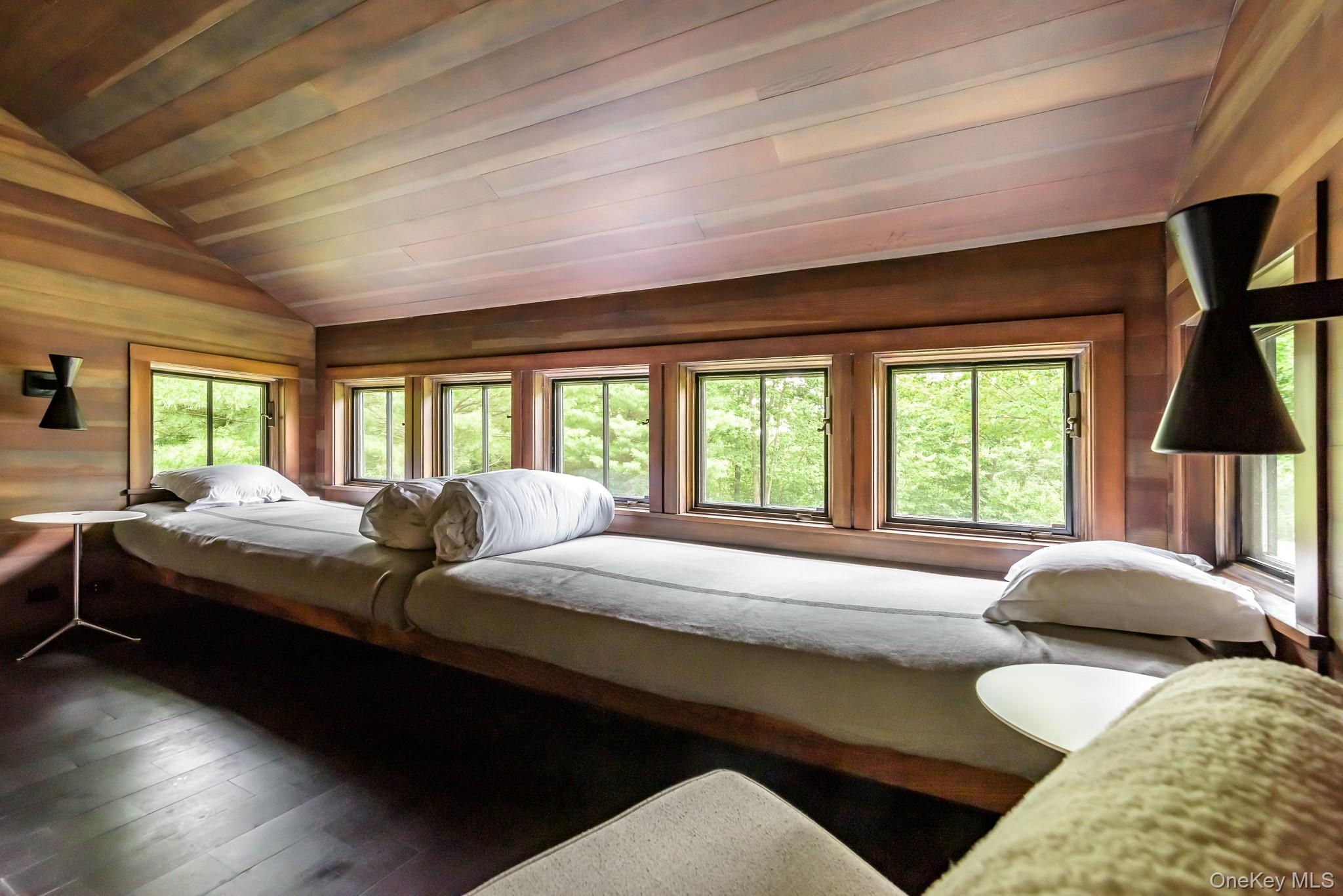 890 Bald Mountain Road Austerlitz, NY 12017 - Photo 23 of 28 Bedroom featuring wood ceiling, vaulted ceiling, wood walls, and hardwood / wood-style flooring