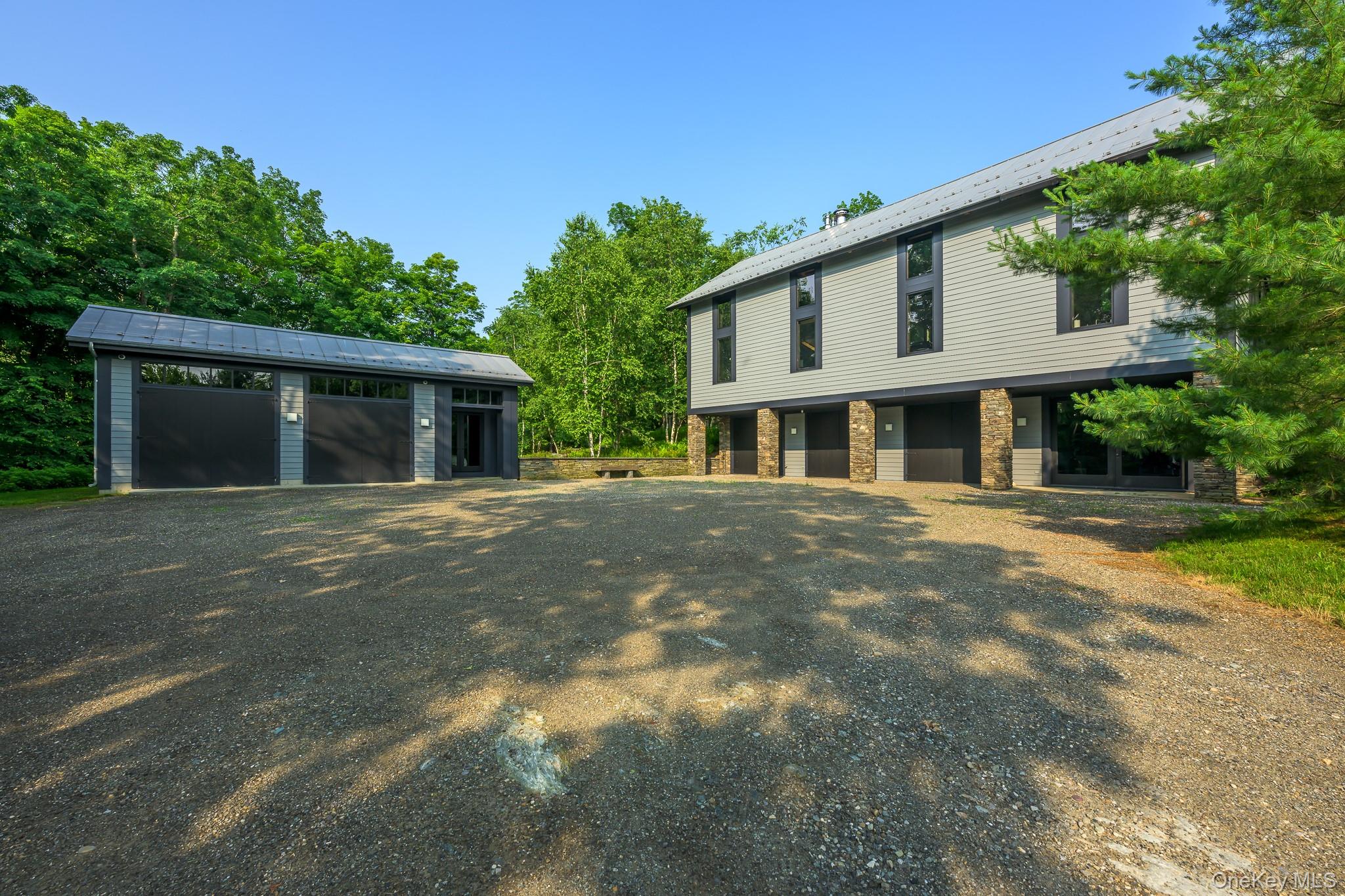 890 Bald Mountain Road Austerlitz, NY 12017 - Photo 5 of 28 View of front of property featuring an outbuilding and a garage