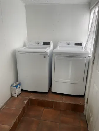 a utility room with a washer and dryer