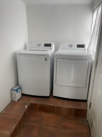 a utility room with a washer and dryer