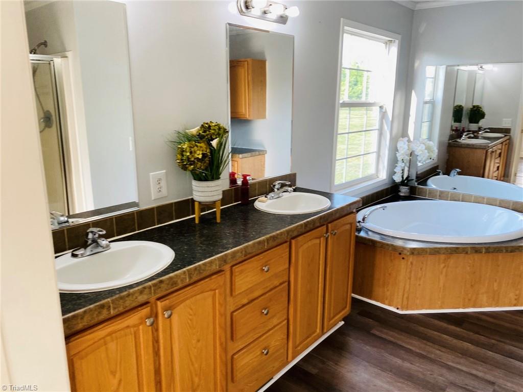 7487 Erect Road Seagrove, NC 27341 - Photo 12 of 20 Double vanity and garden tub- master bath