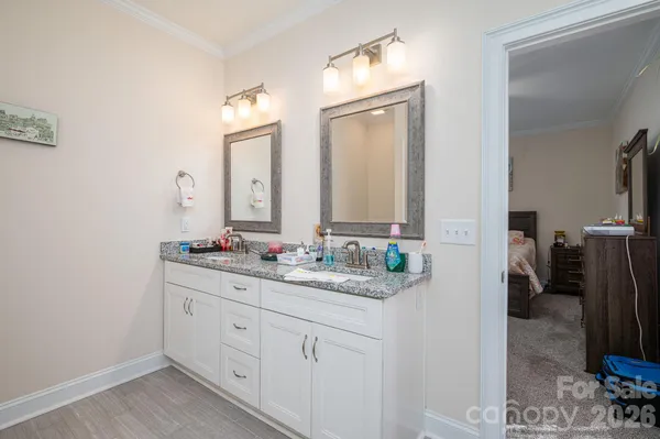 a bathroom with a shower and a tub