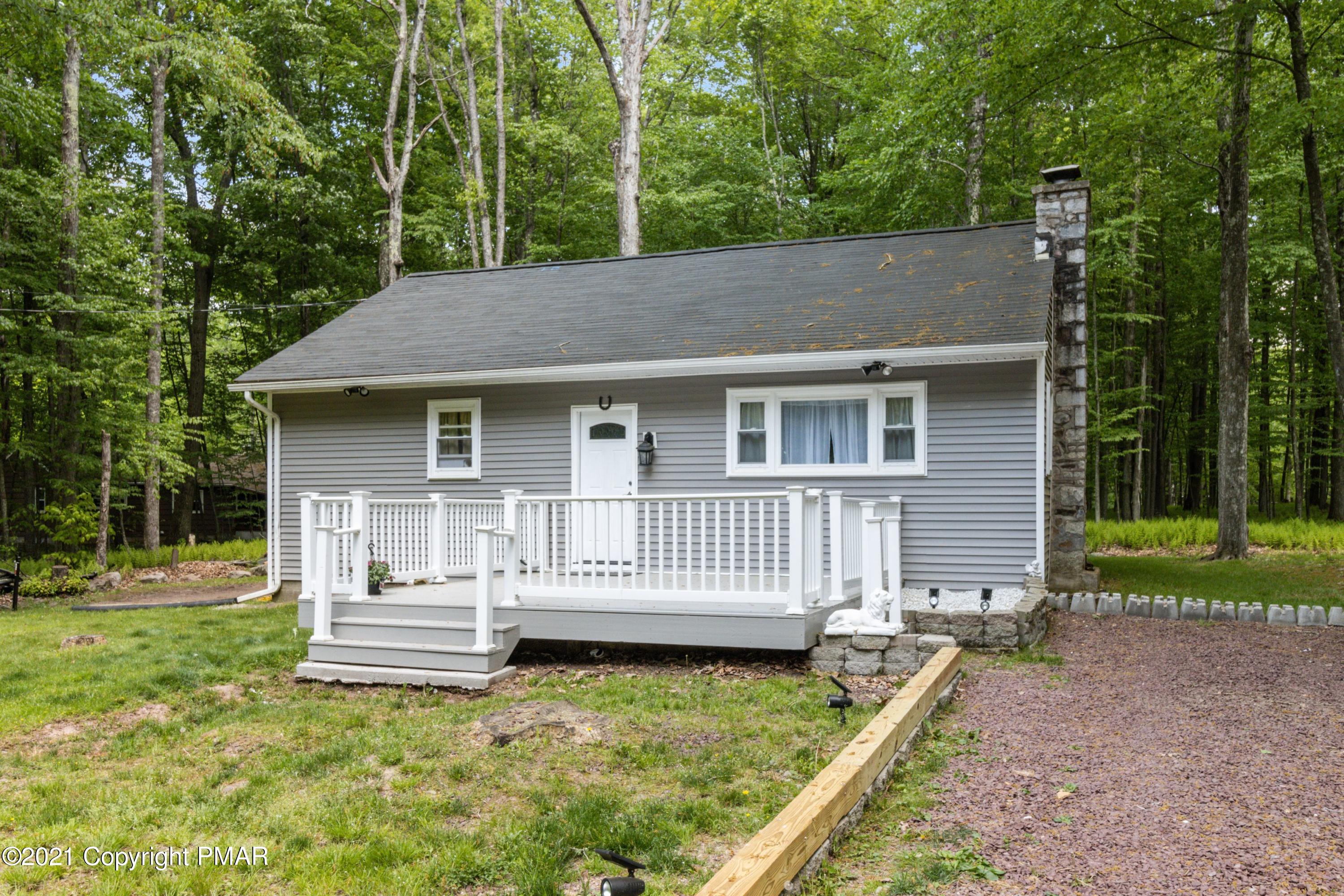 301 Old Ford Road White Haven, PA 18661 - Photo 14 of 22 a view of house with a backyard and a chair