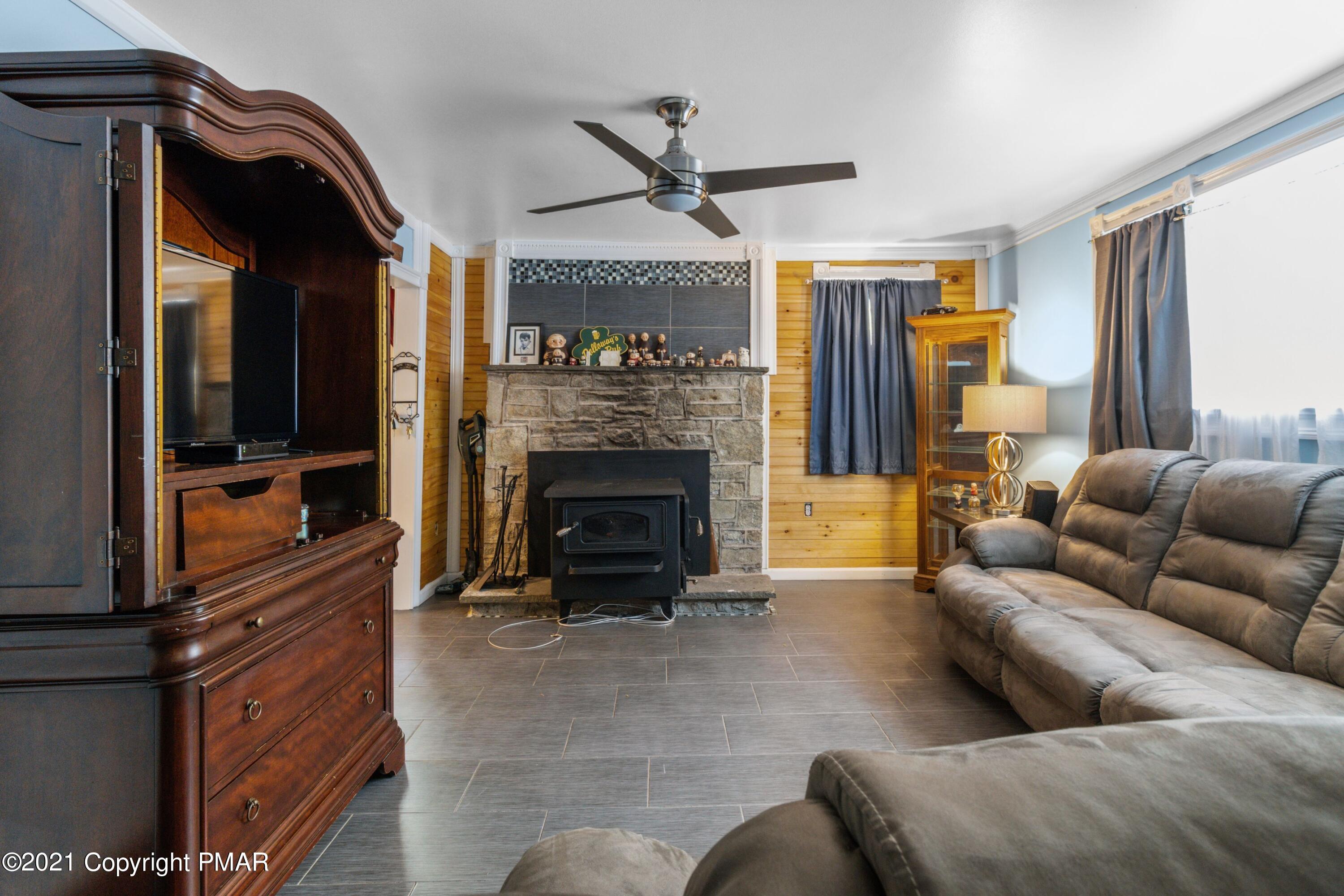 301 Old Ford Road White Haven, PA 18661 - Photo 2 of 22 a living room with furniture and a fireplace