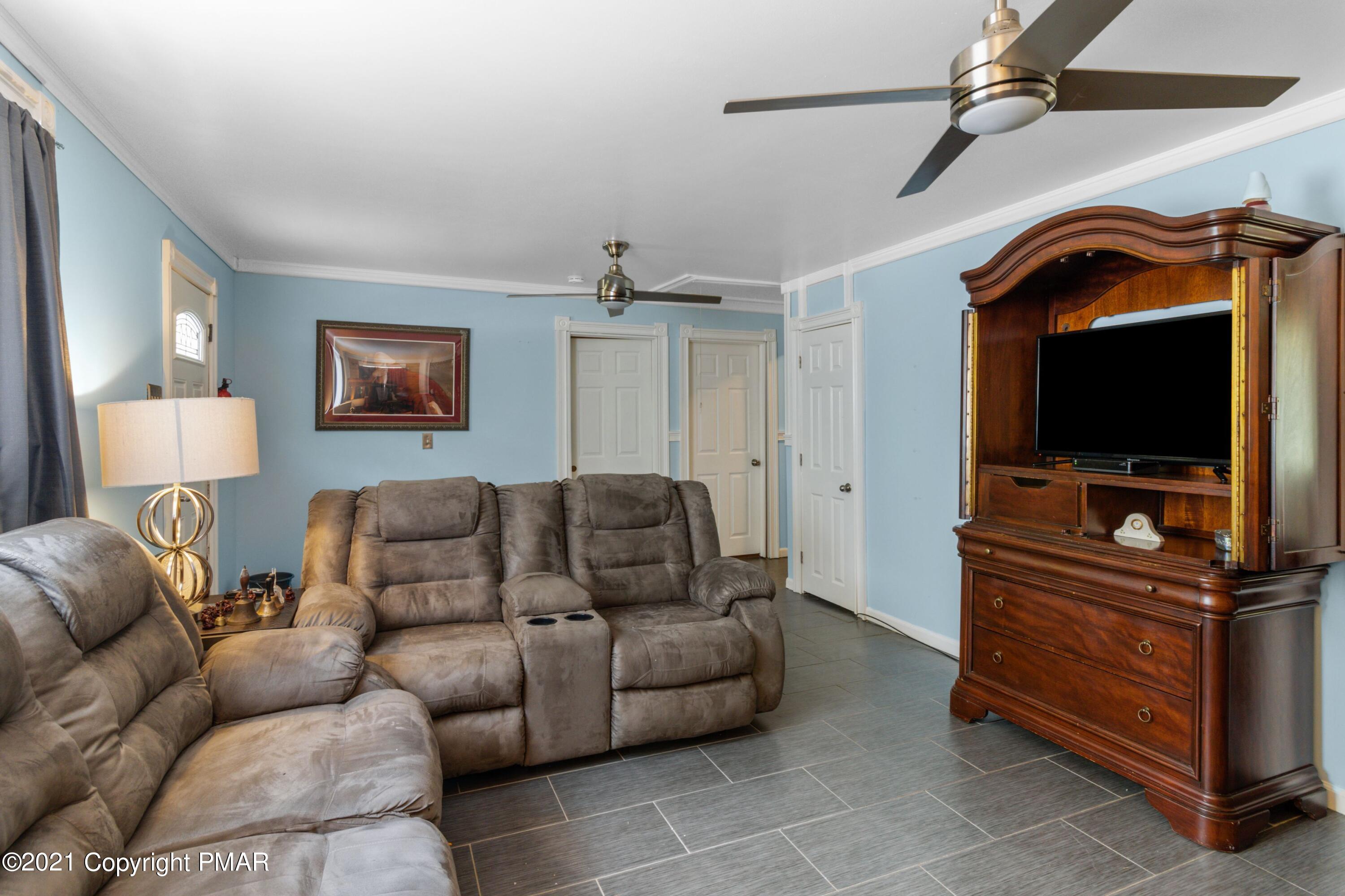 301 Old Ford Road White Haven, PA 18661 - Photo 8 of 22 a living room with furniture and a flat screen tv