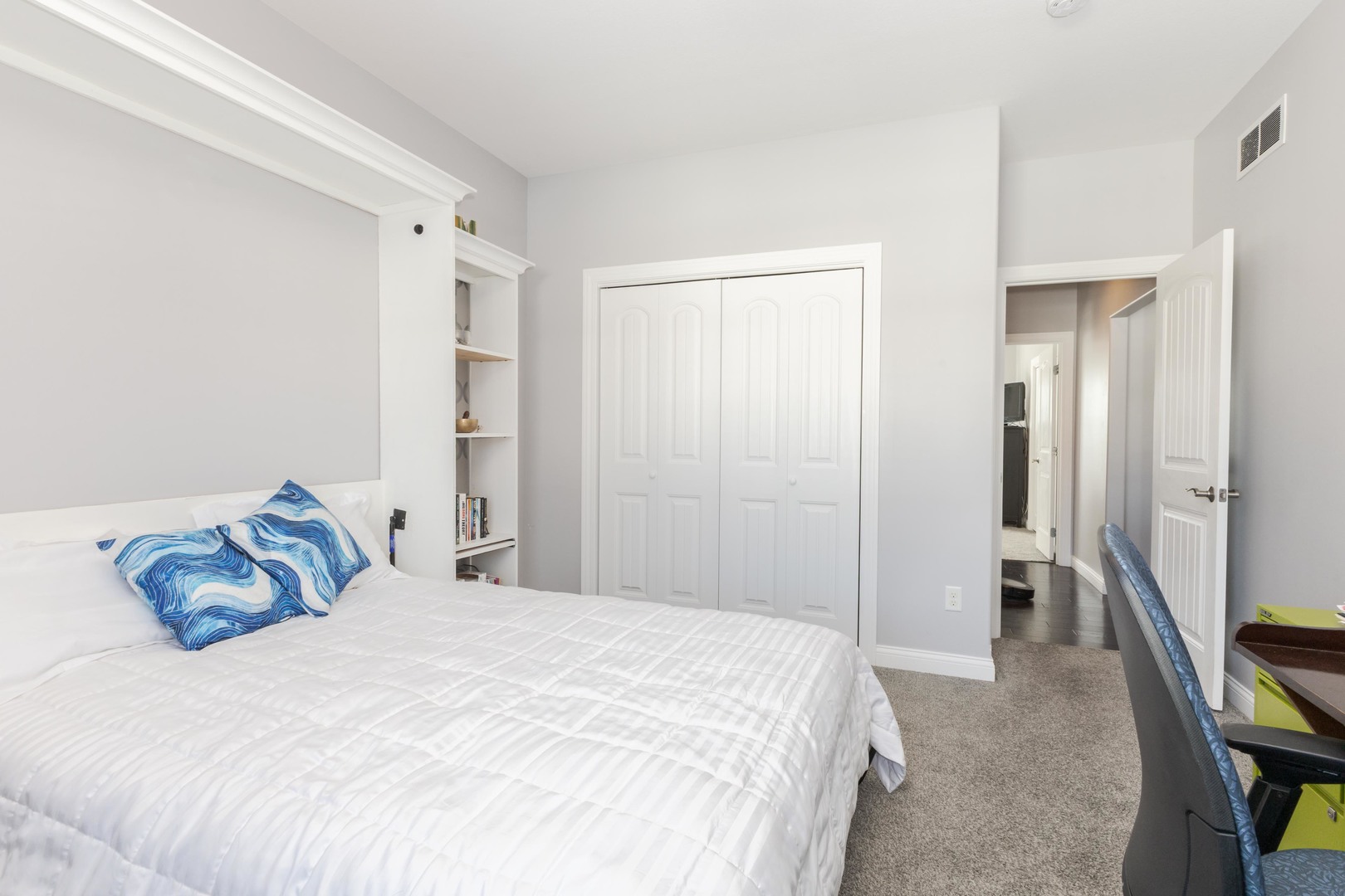 2603 Piney Run Bloomington, IL 61705 - Photo 23 of 42 a bedroom with a bed and a refrigerator