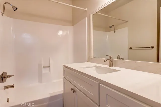 a bathroom with a sink and a bathtub