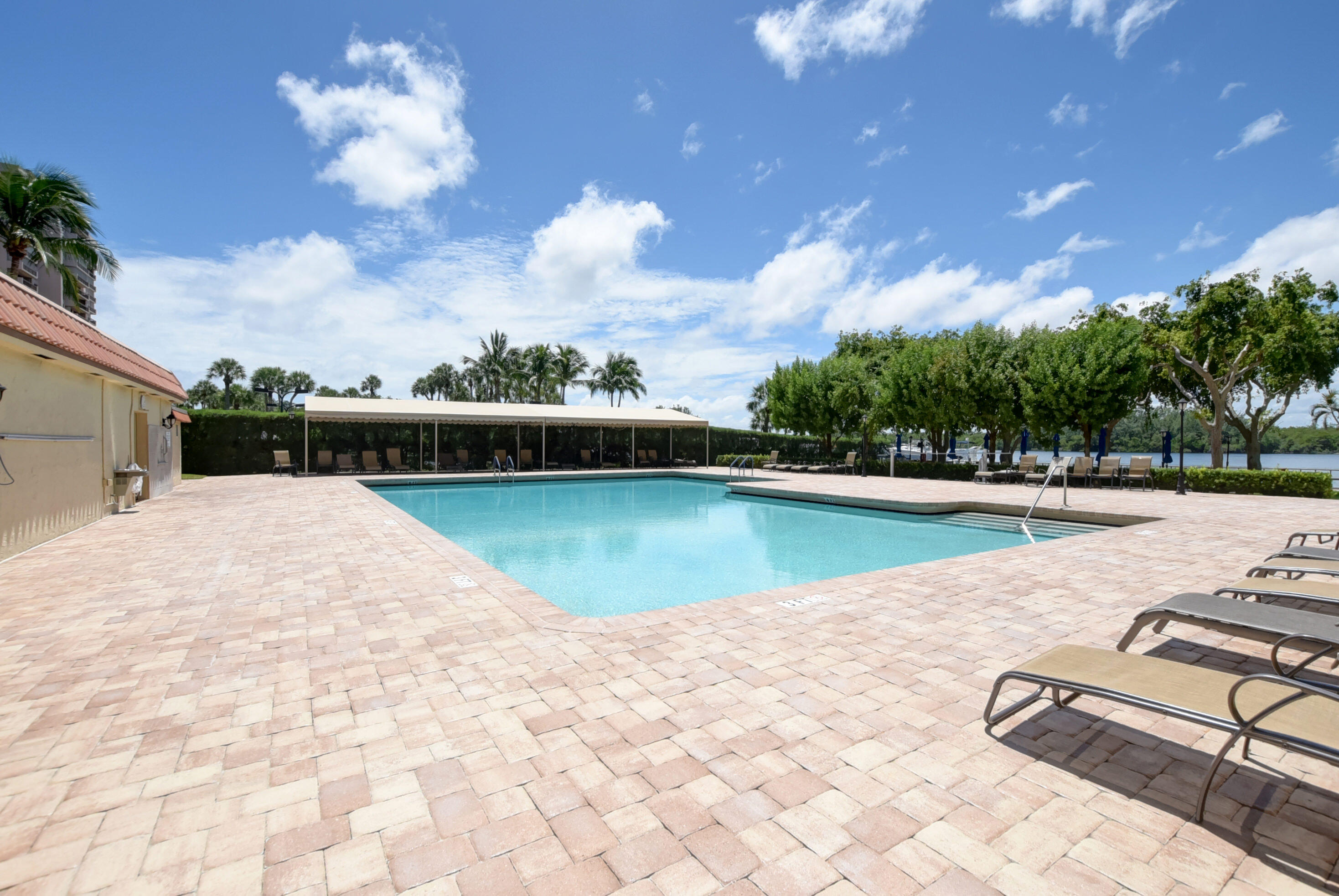 2121 North Ocean Boulevard, Unit 609W Boca Raton, FL 33431 - Photo 19 of 27 a view of a lake with a swimming pool