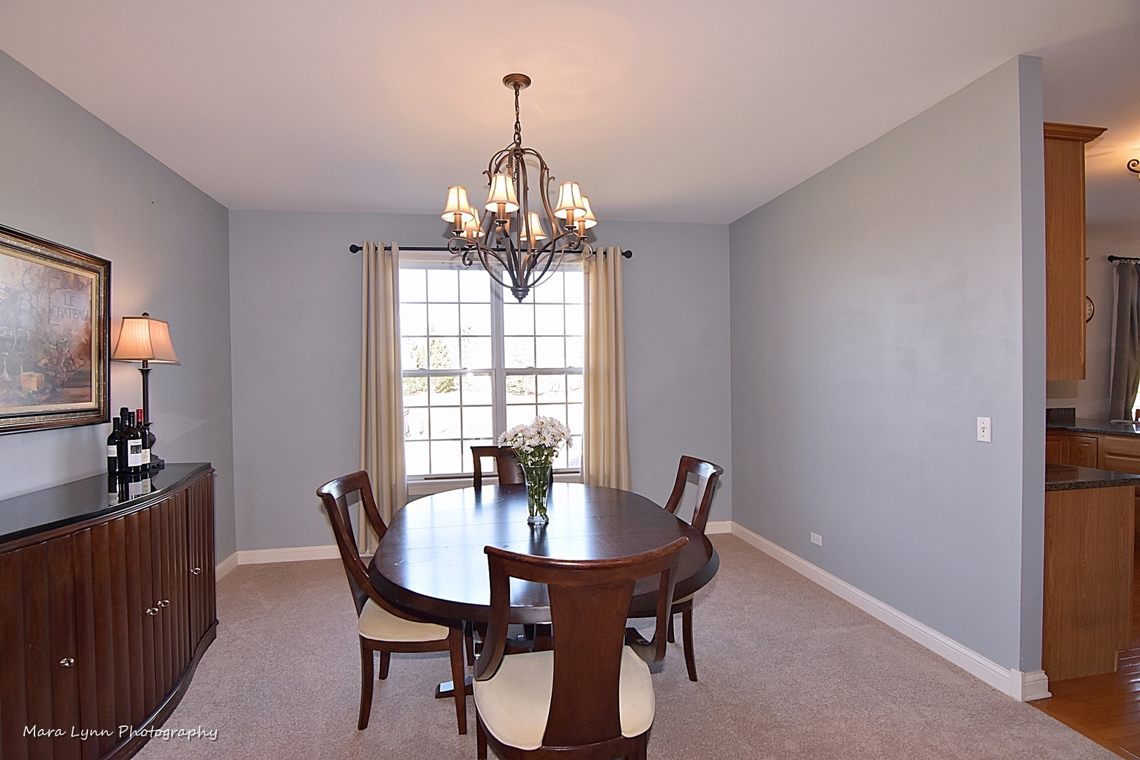 37W200 Red Gate Road St. Charles, IL 60175 - Photo 14 of 47 a view of a dining room with furniture a chandelier and wooden floor