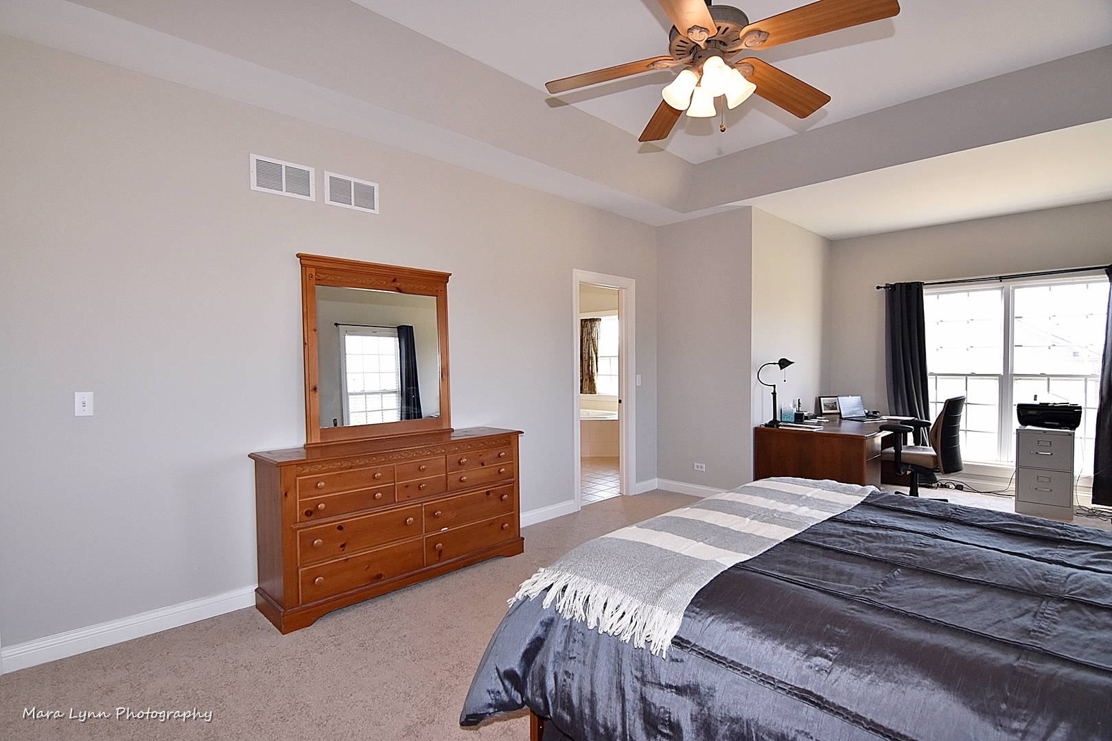 37W200 Red Gate Road St. Charles, IL 60175 - Photo 22 of 47 a bedroom with a bed and a chandelier