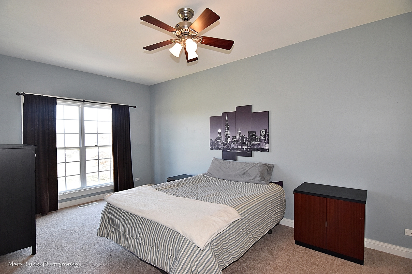 37W200 Red Gate Road St. Charles, IL 60175 - Photo 27 of 47 a bedroom with a large bed and a window