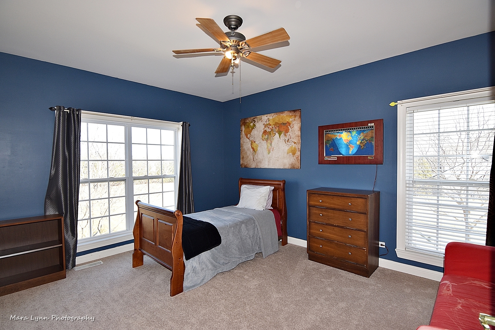 37W200 Red Gate Road St. Charles, IL 60175 - Photo 29 of 47 a living room with furniture and a flat screen tv