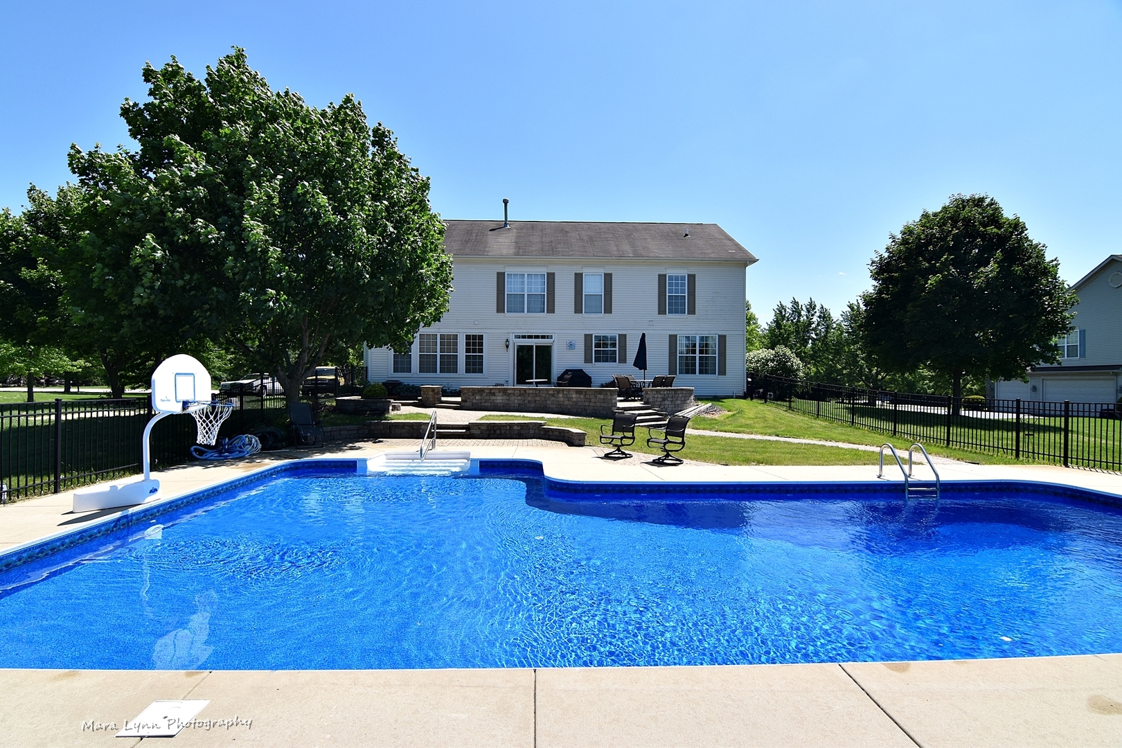 37W200 Red Gate Road St. Charles, IL 60175 - Photo 34 of 47 a view of a swimming pool with a patio