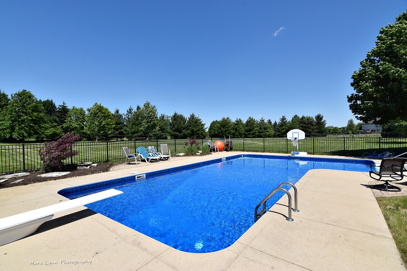 37W200 Red Gate Road St. Charles, IL 60175 - Photo 37 of 47 a view of a swimming pool with a patio