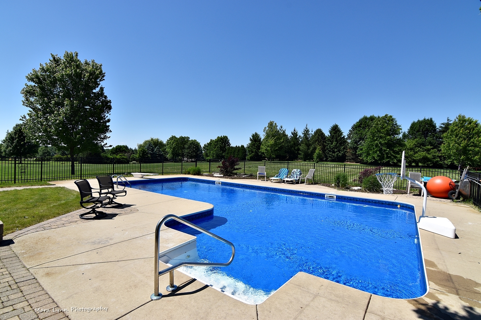 37W200 Red Gate Road St. Charles, IL 60175 - Photo 41 of 47 a view of a swimming pool with a patio