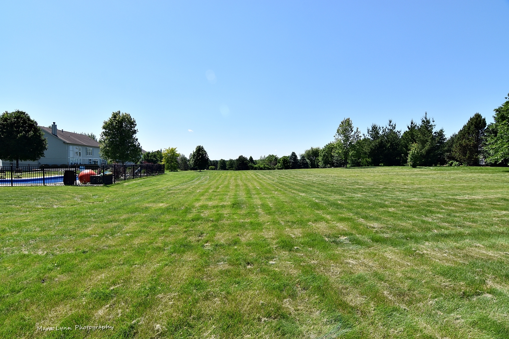 37W200 Red Gate Road St. Charles, IL 60175 - Photo 44 of 47 a view of a field with trees in the background