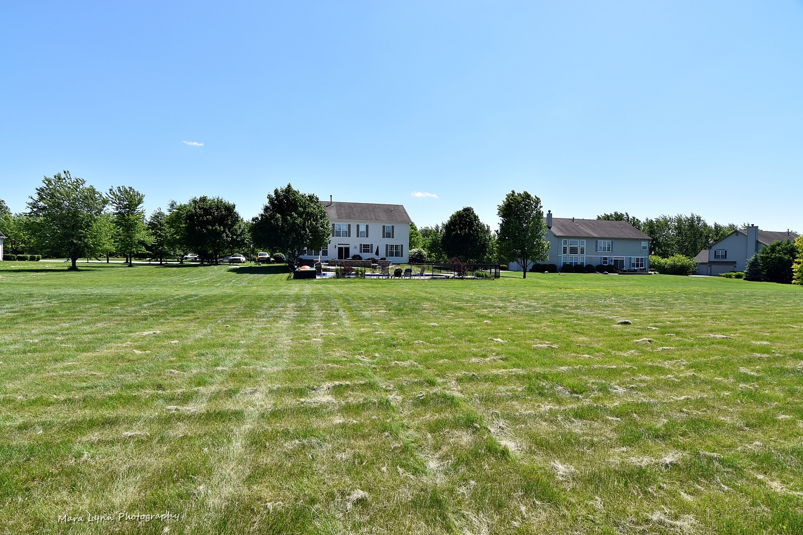37W200 Red Gate Road St. Charles, IL 60175 - Photo 45 of 47 a view of a field with an trees in the background