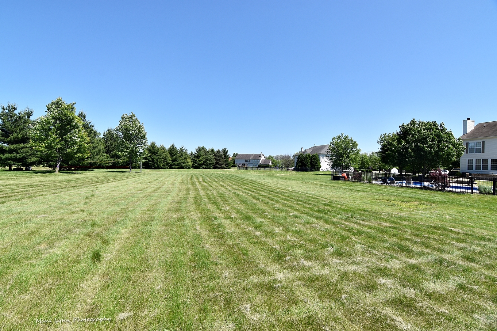 37W200 Red Gate Road St. Charles, IL 60175 - Photo 46 of 47 a backyard of a house with lots of green space