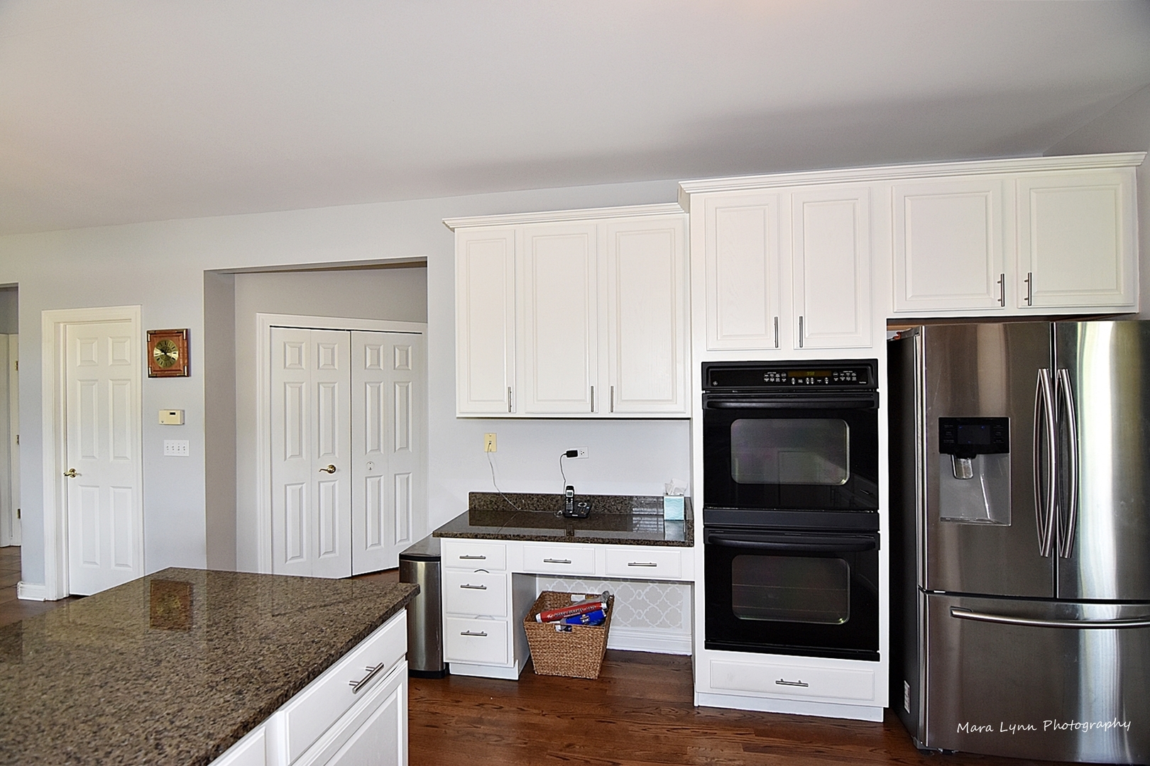 37W200 Red Gate Road St. Charles, IL 60175 - Photo 9 of 47 a kitchen with granite countertop a refrigerator stove and white cabinets