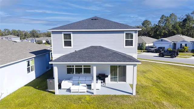 a view of a house with a swimming pool