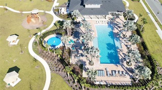 a picture of a living room with a fireplace