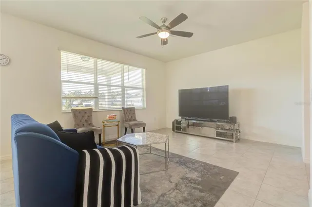 a view of kitchen with cabinets table and chairs