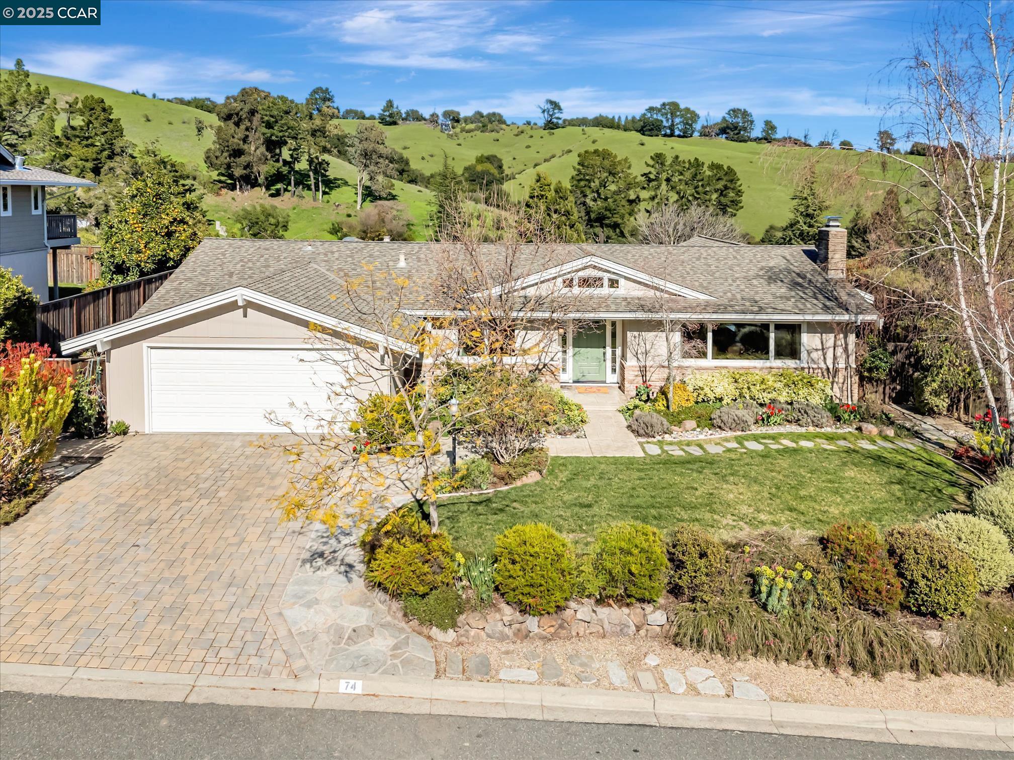 74 Warfield Drive Moraga, CA 94556 - Photo 1 of 1 a view of a big yard with potted plants