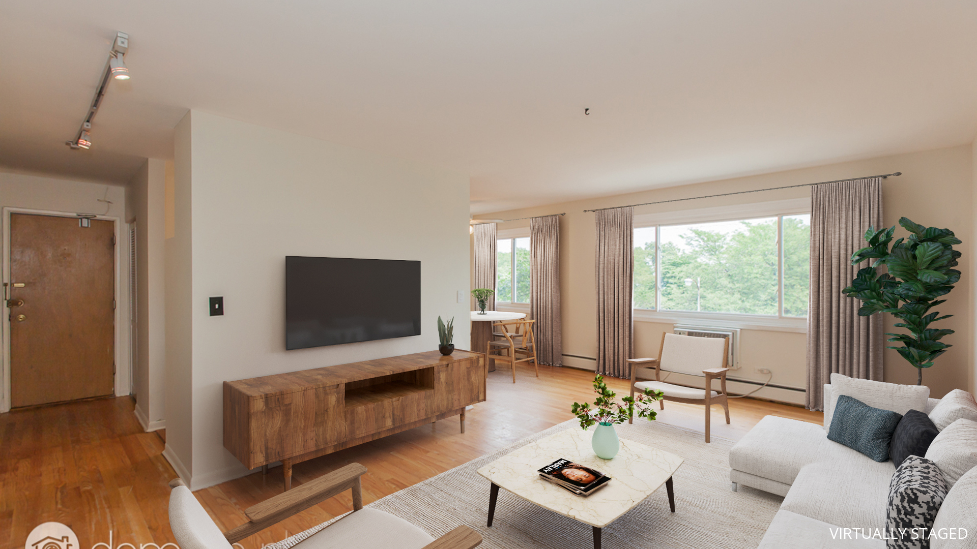 7120 North Sheridan Road, Unit 401 Chicago, IL 60626 - Photo 2 of 9 a living room with furniture and a flat screen tv