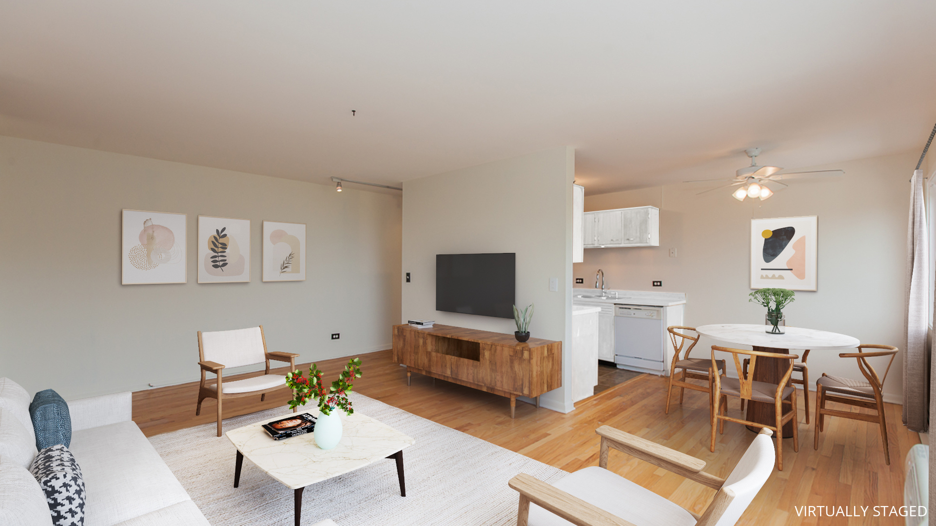 7120 North Sheridan Road, Unit 401 Chicago, IL 60626 - Photo 3 of 9 a living room with furniture a rug and a flat screen tv