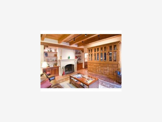 1553 Riata Road Pebble Beach, CA 93953 - Photo 5 of 9 a picture of a living room with a couch