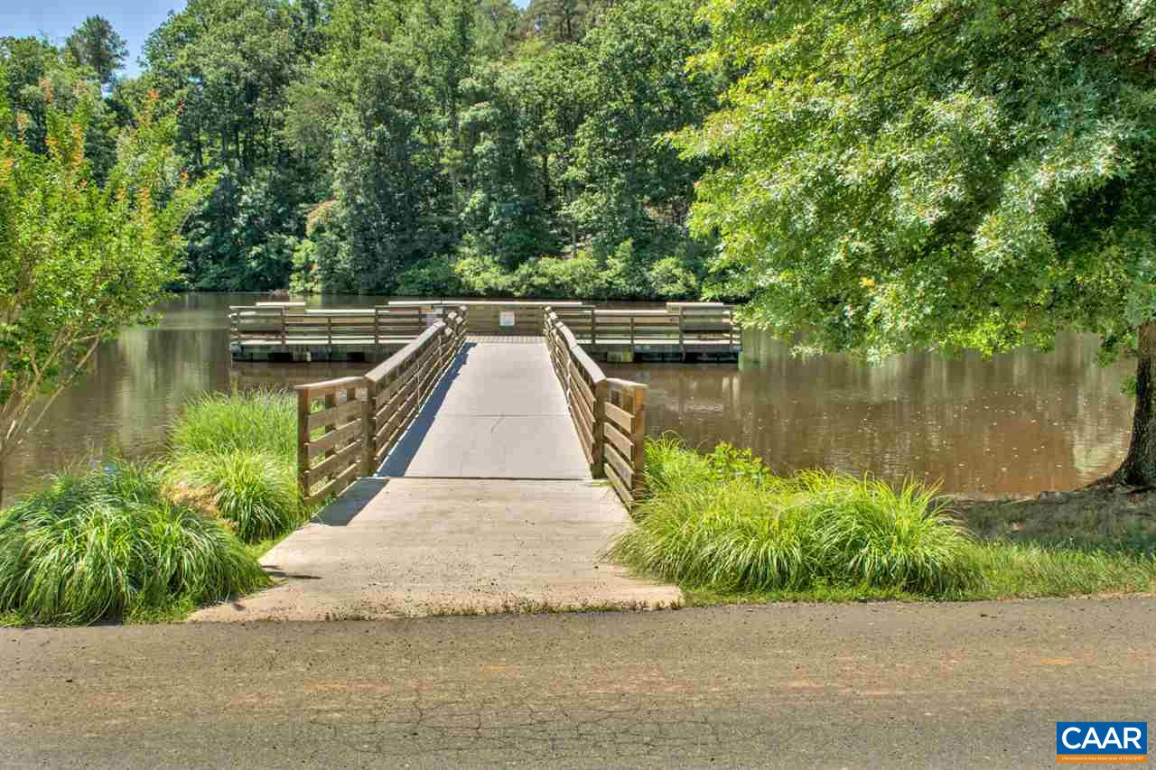 25 Riverside Drive Palmyra, VA 22963 - Photo 49 of 49 a view of a wooden deck and lake