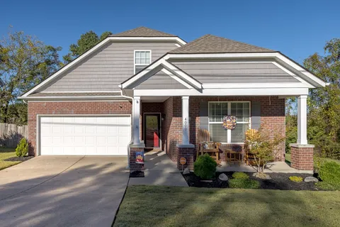 a front view of a house with a porch