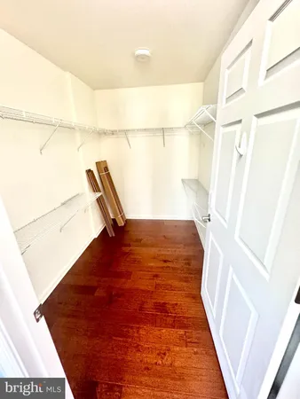 a view of hallway with stairs and the couch