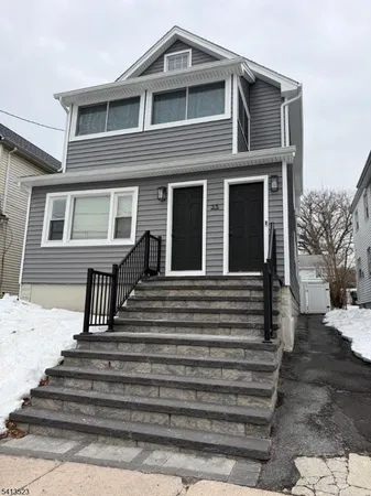 a front view of a house with a balcony