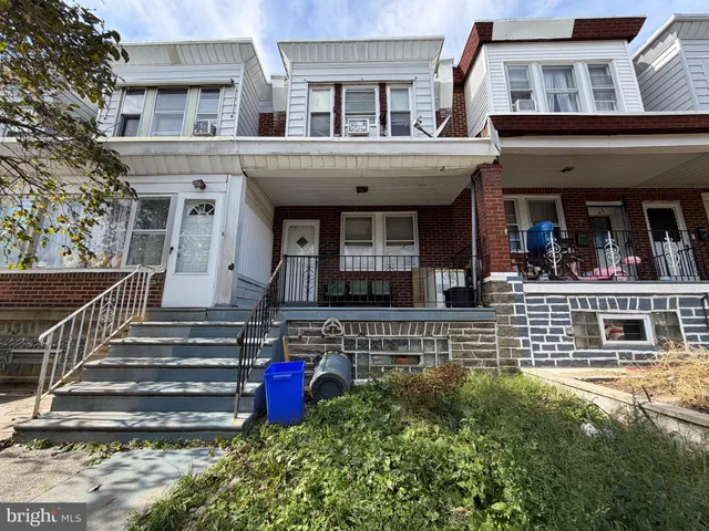 a front view of house with an outdoor space